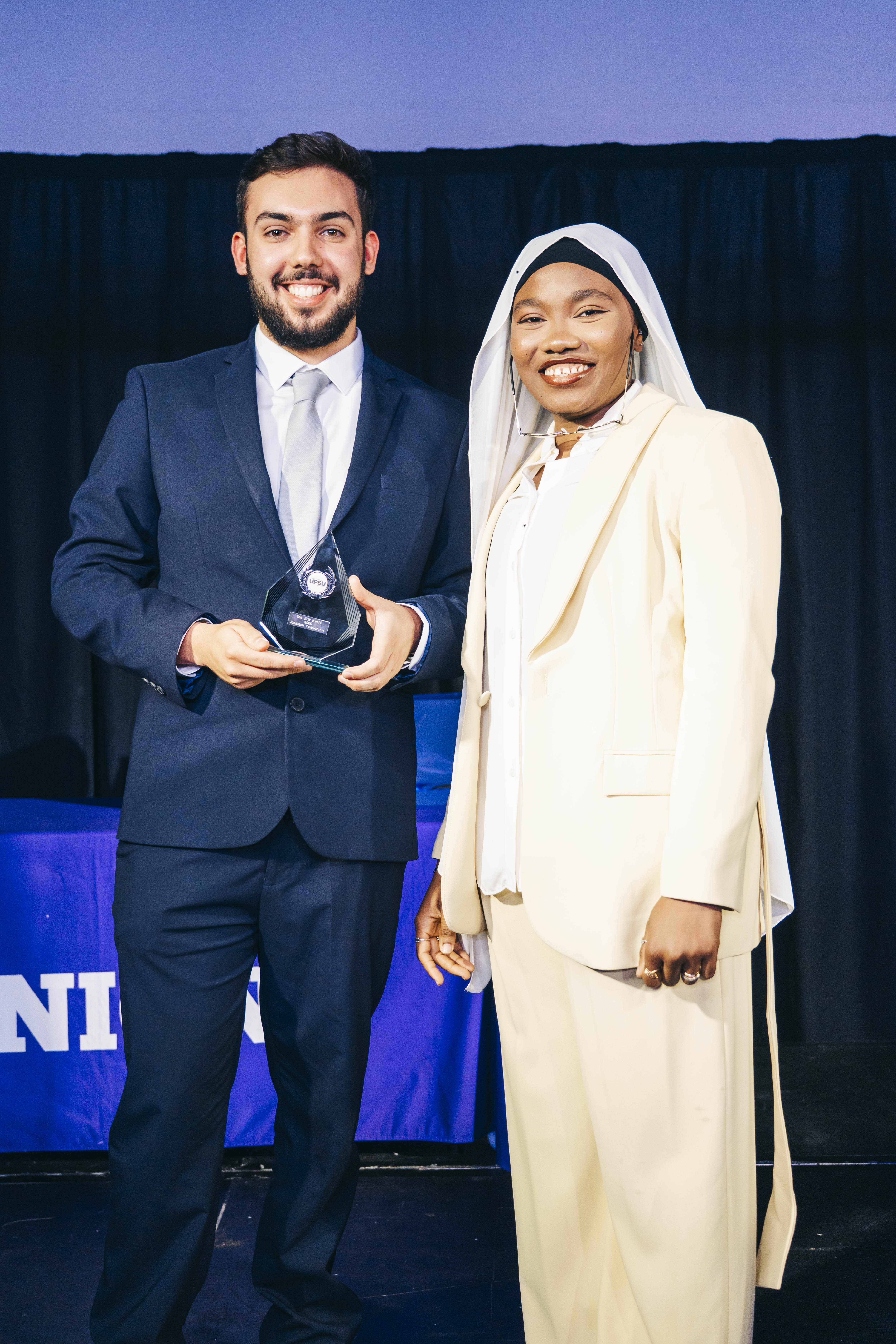 Picture of Jonathan winning the award